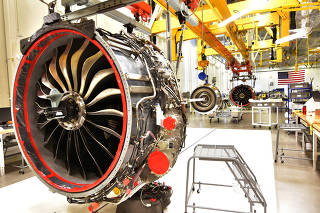 FILE PHOTO: Technicians build LEAP engines for jetliners at a new, highly automated General Electric (GE) factory in Lafayette
