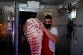 FILE PHOTO: High beef prices squeeze carnivores from Buenos Aires to New Orleans