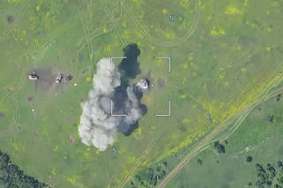 Drone footage shows a burning armoured vehicle in an unidentified location after the Defence Ministry in Moscow said that Russian forces have thwarted a major Ukrainian offensive in the Donetsk region
