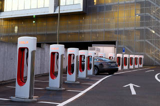FILE PHOTO: Tesla Supercharger stations are seen near Affoltern am Albis