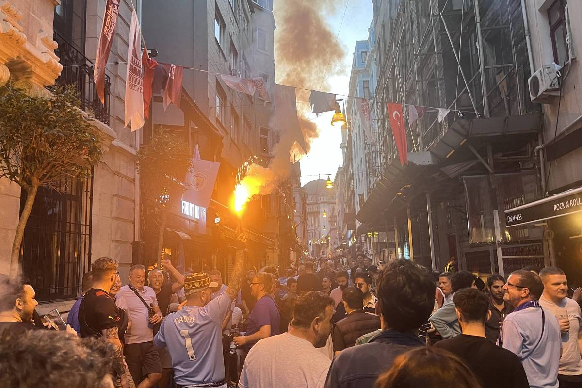 Manchester City fans celebrate the Champions League title until the sun comes up in Istanbul