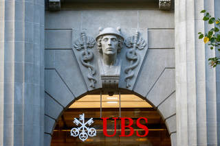 FILE PHOTO: Logo of Swiss bank UBS is seen at its Zurich headquarters