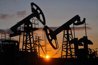 FILE PHOTO: A view shows oil pump jacks outside Almetyevsk