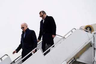 FILE PHOTO: U.S. President Joe Biden disembarks from Air Force One in Syracuse, New York