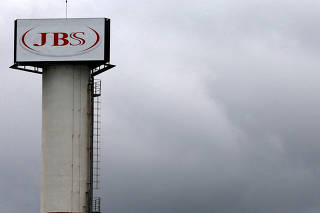 FILE PHOTO: The logo of Brazilian meatpacker JBS SA is seen in the unit   in the city of Jundiai