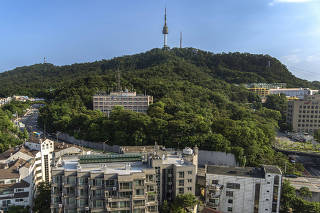 The Seoul Youth Hostel, in a building once home to the feared Korean Central Intelligence Agency, on Mt. Namsan in Seoul on June 9, 2023. (Chang W. Lee/The New York Times)