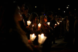People participate in a vigil in support of the 4,815 children that were sexually abused by members of the Portuguese Catholic Church, according to the commission investigating the issue, in Lisbon