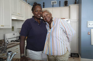 Gail Marquis, 56, a former Olympic basketball player, left, and Audrey Smaltz, 74, who have been a couple for 12 years and have 2011 wedding plans, at their weekend home in Jersey City, N.J.