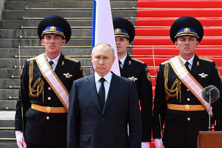 Russian President Putin addresses service members in Moscow