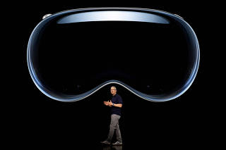 FILE PHOTO: Apple CEO Tim Cook introduces Apple Vision Pro at Apple Park in Cupertino