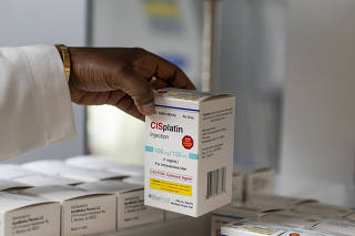 A cisplatin injection box in the pharmaceutical storage room at the Center for Cancer and Blood Disorders in Fort Worth, Texas, June 16, 2023. (Emil Lippe/The New York Times)
