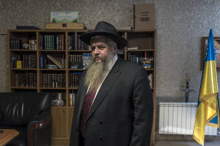 Rabbi Moshe Reuven Azman, the chief rabbi of Ukraine, in his office at the Brodsky Synagogue in Kyiv, June 20, 2023. (Brendan Hoffman/The New York Times)