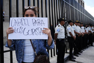 Supporters of anti-graft presidential candidate Bernardo Arevalo protest in Guatemala City