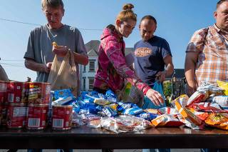 Huntington Ministries Serve Those In Need At Weekly Food Drive Event