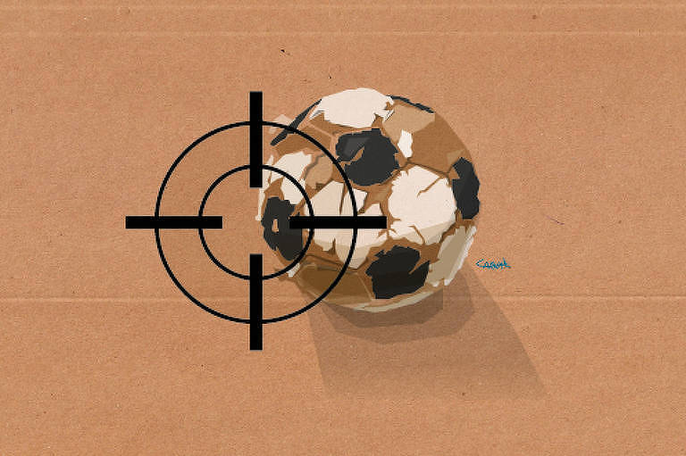 Uma antiga e muito usada bola de futebol é focalizada pela mira de uma arma. O fundo é marrom.