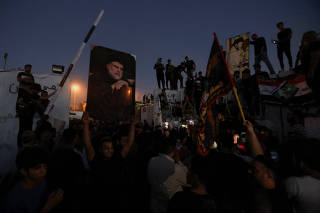 Protesters gather near the Swedish embassy in Baghdad