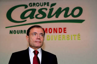 FILE PHOTO: Naouri, Chairman and Chief Executive of French retailer Casino, poses following the company's 2012 annual results