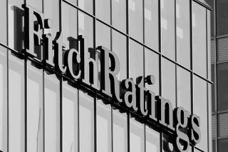 FILE PHOTO: FILE PHOTO: The Fitch Ratings logo is seen at their offices at Canary Wharf financial district in London