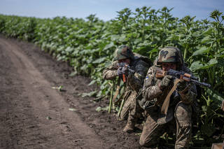 Ukrainian marines attend military drills near a frontline in Donetsk region