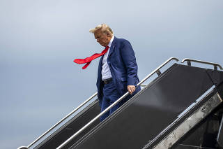 Former President Donald Trump, a candidate for the Republican presidential nomination, arrives at Reagan National Airport in Washington en route to his arraignment in federal court on Thursday, Aug. 3, 2023. Trump is facing charges of trying to overturn the results of the 2020 election. (Doug Mills/The New York Times)