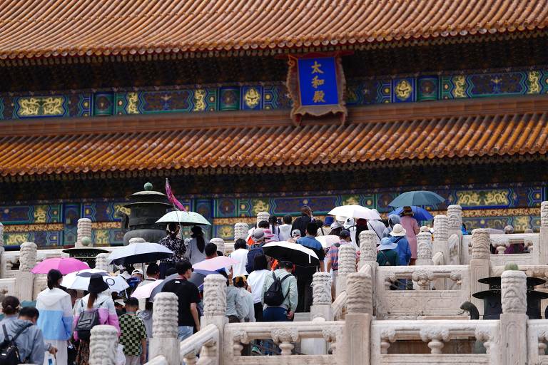 Turistas visitam a Cidade Proibida, em Pequim