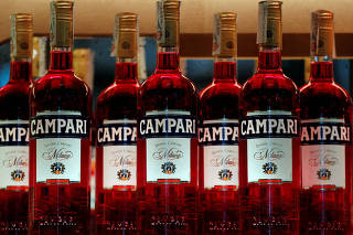 FILE PHOTO: Campari bottles are seen in a bar downtown Milan