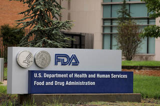 FILE PHOTO: FILE PHOTO: Signage is seen outside of FDA headquarters in White Oak, Maryland