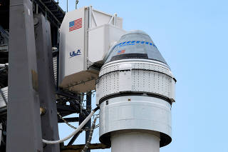 FILE PHOTO: Boeing's CST-100 Starliner spacecraft is prepared for launch, at Cape Canaveral