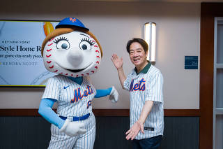 Taiwan's Vice President William Lai poses for a picture while attending a baseball game in New York City, New York