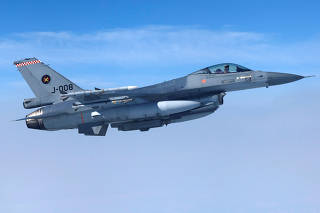 Netherlands' Air Force F-16 fighter jet flies during a media day