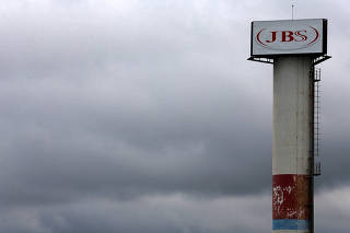 FILE PHOTO: The logo of Brazilian meatpacker JBS SA is seen in the unit in the city of Jundiai