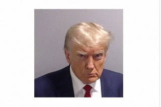A post by former U.S. President Donald Trump of his police booking mugshot