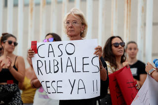 People protest outside the Spanish Soccer Federation
