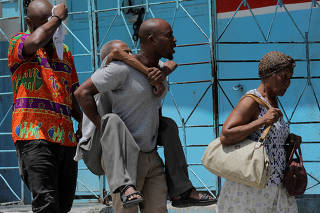 FILE PHOTO: People fleeing from gang violence, in Port-au-Prince