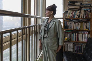 Sun Junli at her current apartment that she rents from a friend after after her home was seized by a court over debt in Xianggang, China, Aug. 26, 2023. (The New York Times)