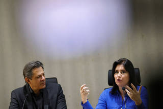 Brazil's Finance Minister Haddad and Brazil's Planning and Budget Minister Tebet attend a press conference in Brasilia