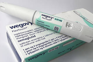 A injection pen of Novo Nordisk's weight-loss drug Wegovy is shown in this photo illustration in Oslo