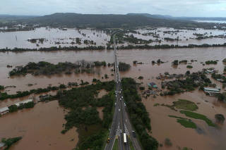 An aerial view shows damage and floods after a cyclone hit southern towns, in Venancio Aires