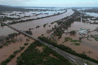 An aerial view shows damage and floods after a cyclone hit southern towns, in Venancio Aires