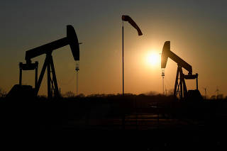 FILE PHOTO: Wintershall Dea pump jacks on an  oil field in Emlichheim