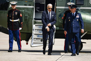 President Joe Biden steps off Marine One before boarding Air Force One at Joint Base Andrews, Thursday, Aug. 17, 2023.  (Samuel Corum/The New York Times)