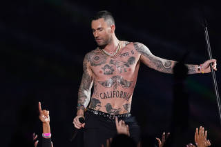 Adam Levine of Maroon 5 performs at halftime during Super Bowl LIII between the New England Patriots and the Los Angeles Rams at Mercedes-Benz Stadium in Atlanta.