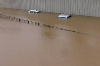 A view of cars submerged at a flooded area after heavy rains in Hong Kong