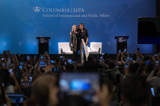 Hillary Clinton and her teaching partner at Columbia University, Keren Yarhi-Milo, pause their lecture to allow students to take photographs at the university in Manhattan, Sept. 6, 2023. (Maansi Srivastava/The New York Times)