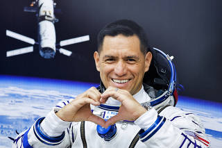 NASA astronaut Frank Rubio reacts during his space suit check shortly before the launch to the International Space Station (ISS) at the Baikonur Cosmodrome