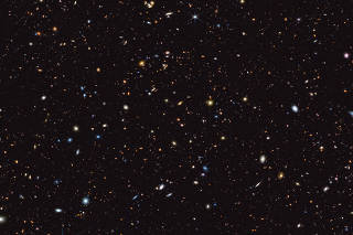 An infrared image from NASAÕs James Webb Space Telescope showing an area of the sky known as GOODS-South, which has more than 45,000 galaxies visible here, many less than 600 million years old. (NASA, ESA, CSA, Brant Robertson (UC Santa Cruz), Ben Johnson (CfA), Sandro Tacchella (Cambridge), Marcia Rieke (University of Arizona), Daniel Eisenstein (CfA) via The New York Times)