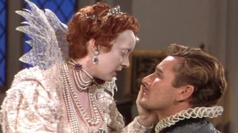 Bette Davis and Errol Flynn in Meu Reino Por um Amor (1939)