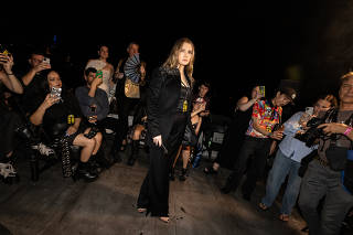 Anna Sorokin, also known as Anna Delvey, attends the Shao fashion show on the rooftop of her East Village apartment building in New York, Sept. 11, 2023. (Rebecca Smeyne/The New York Times)