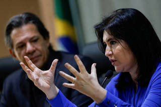 FILE PHOTO: Brazil's Finance Minister Haddad and Brazil's Planning and Budget Minister Tebet attend a press conference in Brasilia
