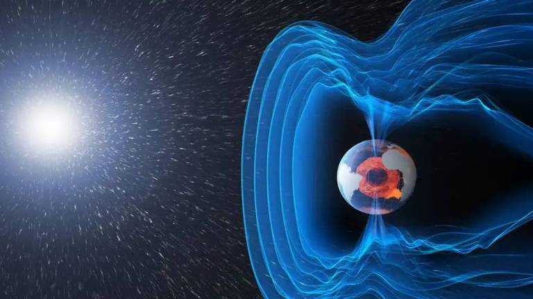 Ilustração mostra campo magnético em volta da Terra e o sol ao fundo